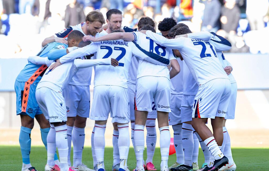 Bolton Wanderers players huddle during the Sky Bet Championship match