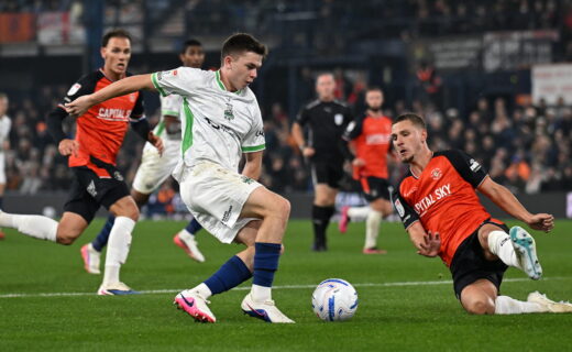 Luton Town and Barnsley players in action
