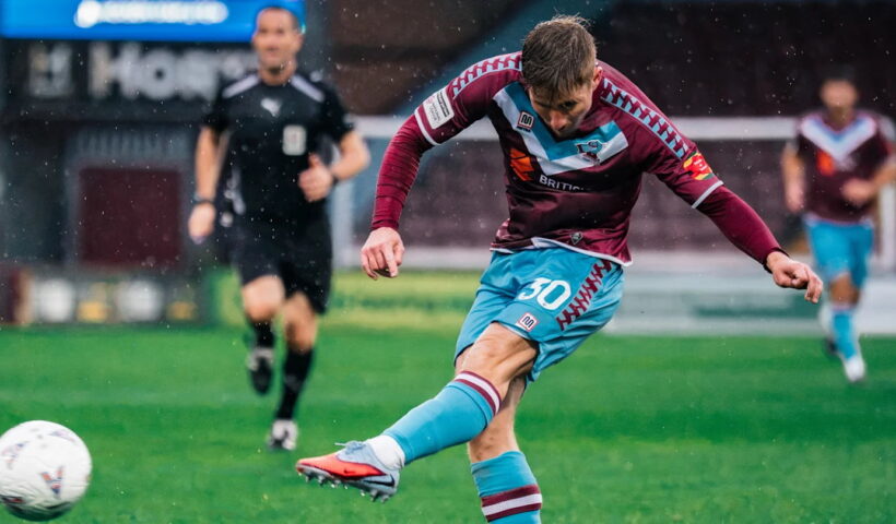 Regan Clayton in action for Scunthorpe United