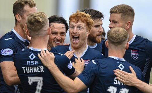 Ross County Players Celebrate During a Match